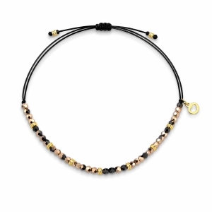 Bransoletka na sznurku z kamieniami Swarovski i pozłacanym srebrem